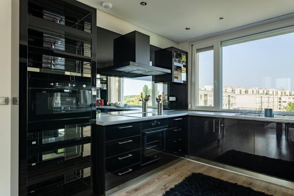 Martonfalvi Penthouse W Jacuzzi เดเบรตเซน ภายนอก รูปภาพ